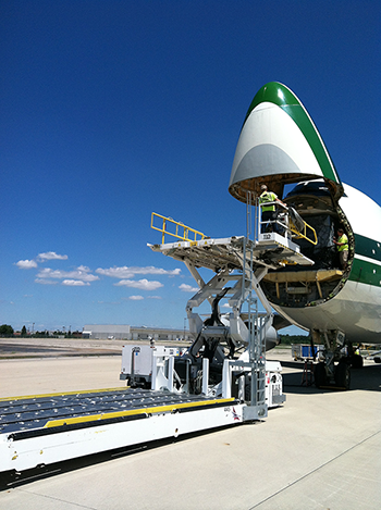 The front of an airplane with the nose open